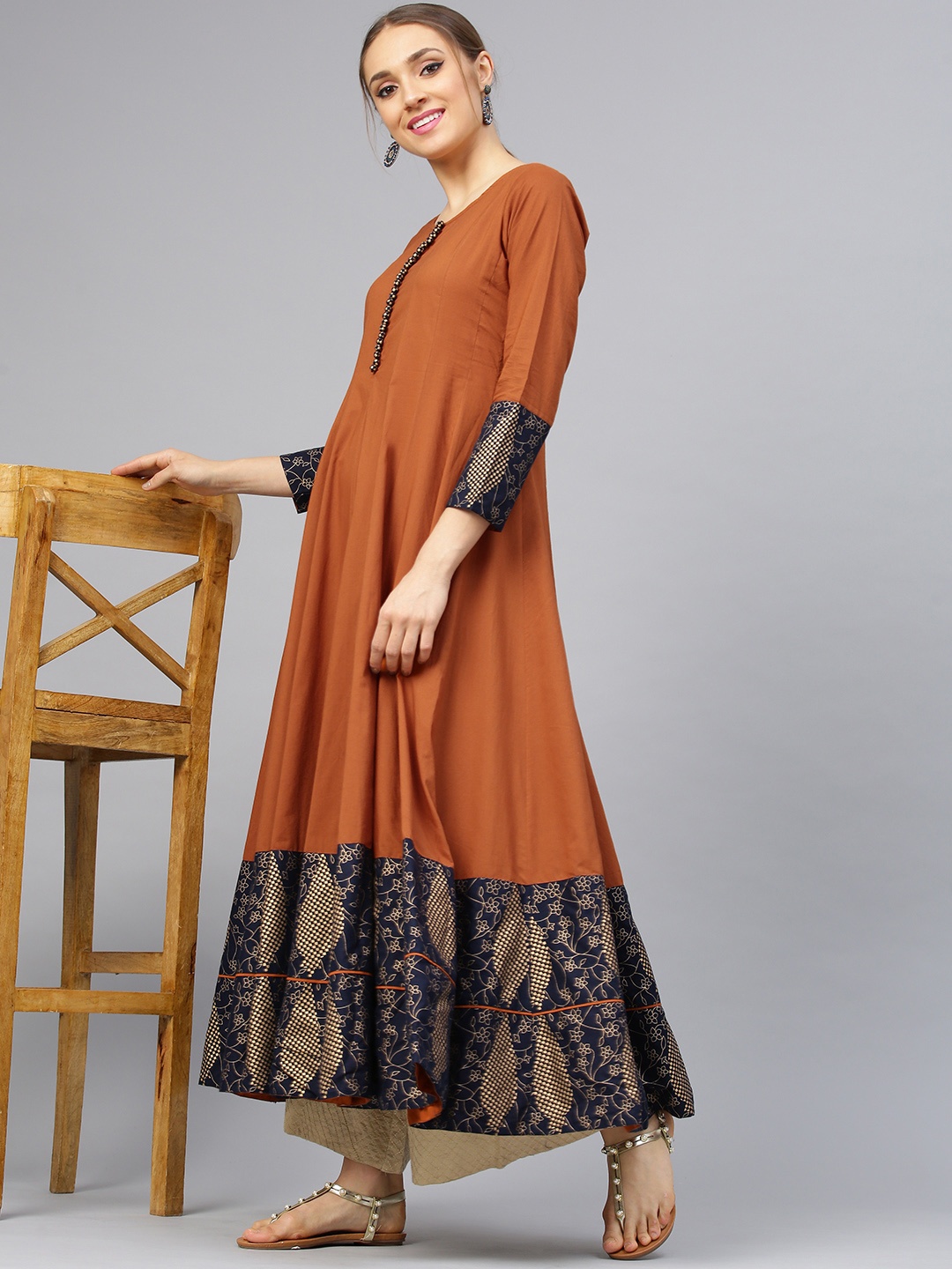 

Idalia Women Rust Brown Solid Anarkali Kurta