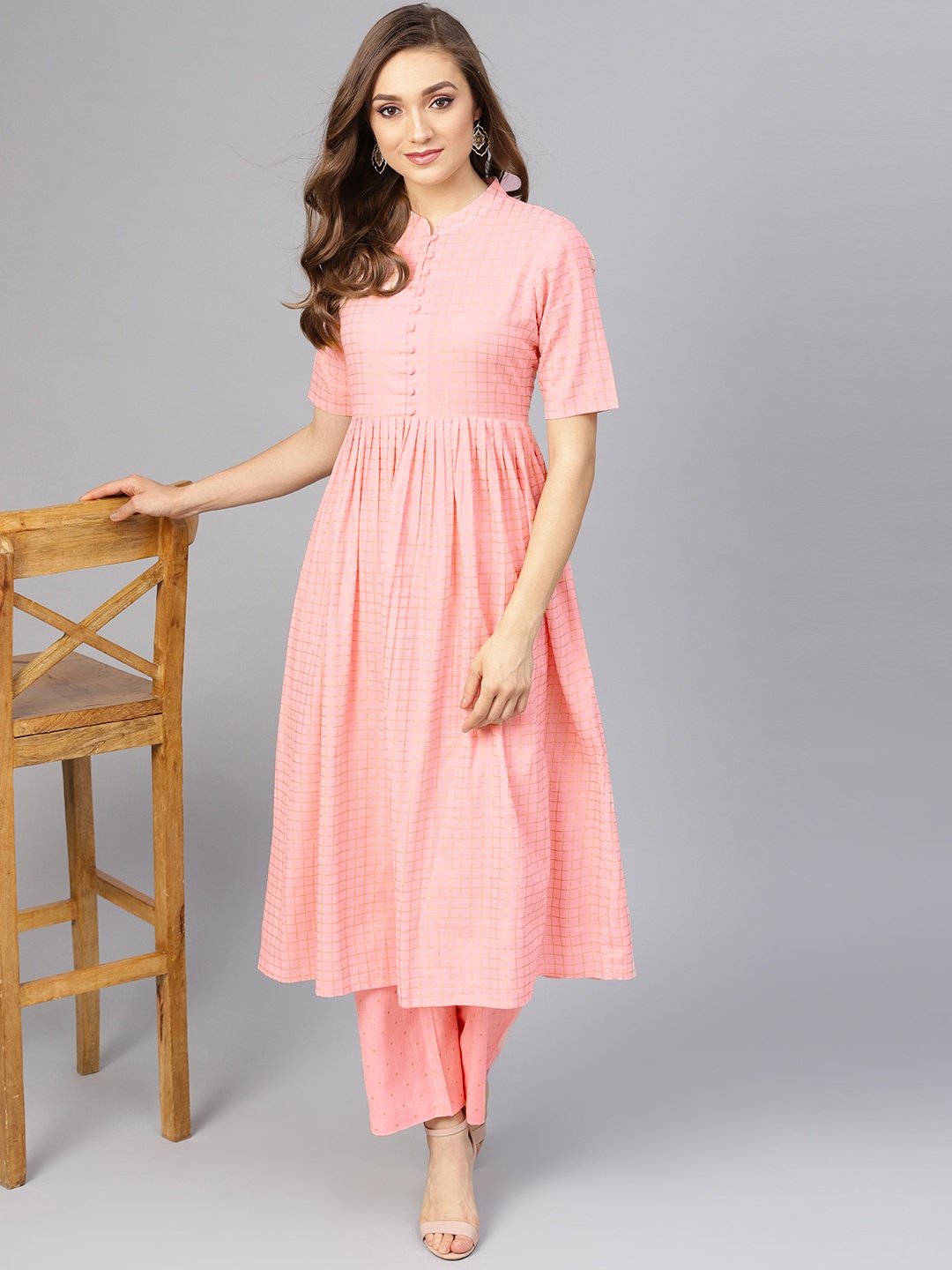 

Idalia Women Pink & Golden Printed Kurta with Palazzos