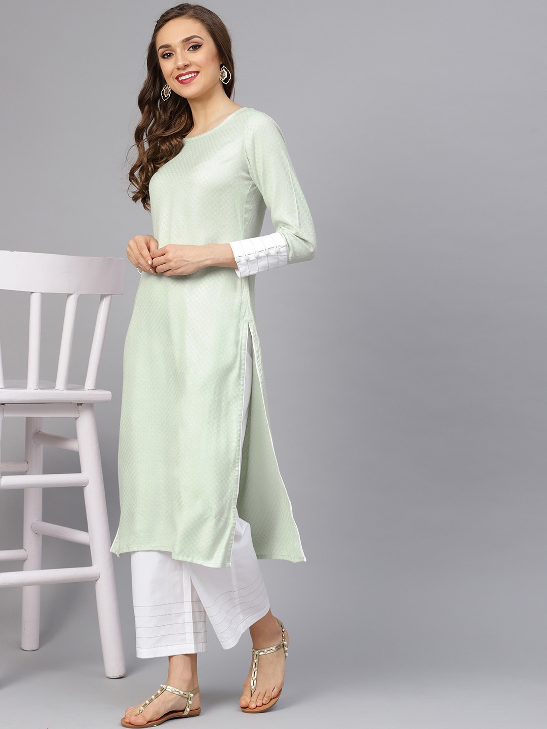 

Idalia Women Mint Green & White Self Design Kurta with Palazzos
