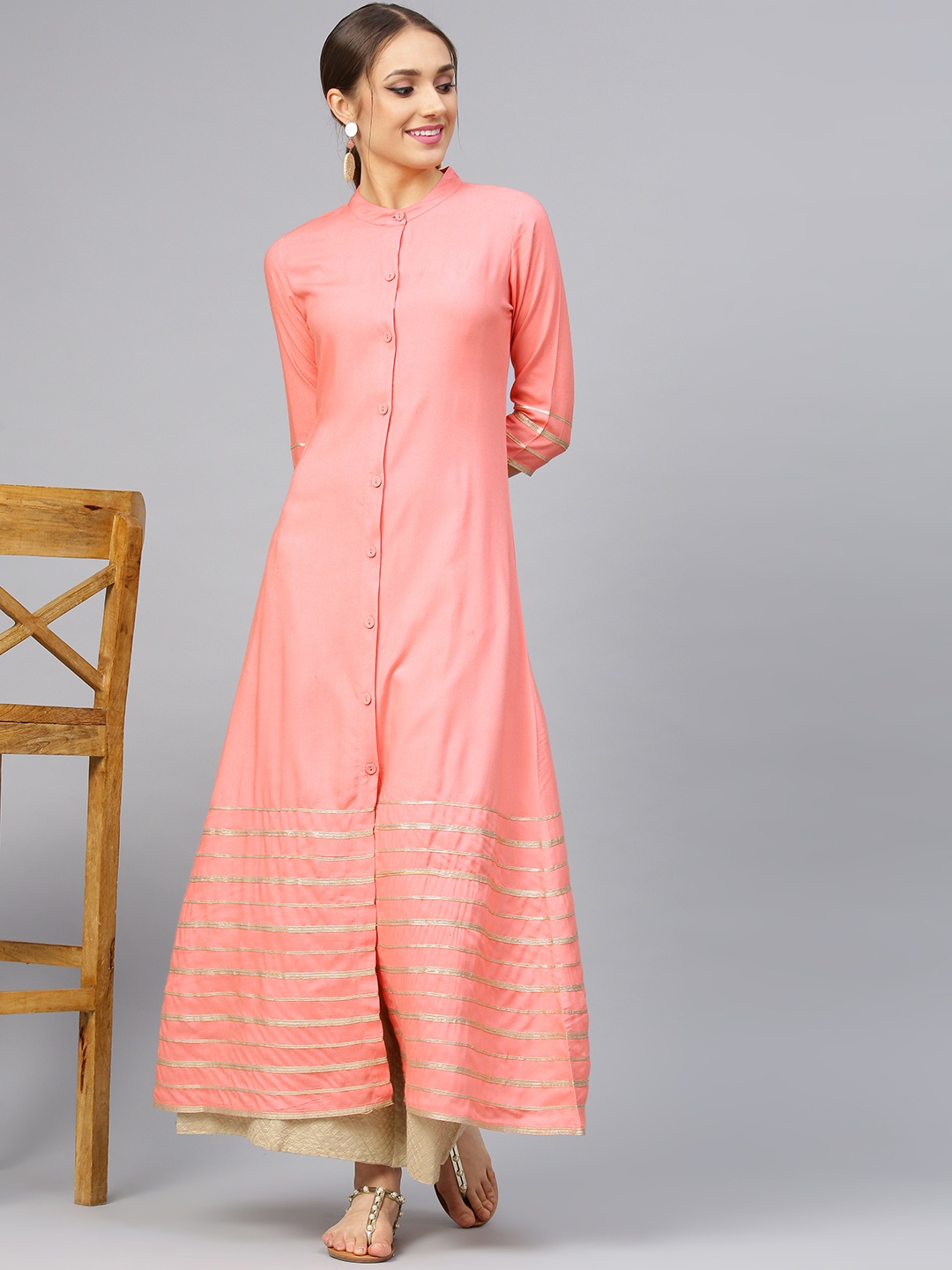 

Idalia Women Peach-Coloured Solid A-Line Kurta