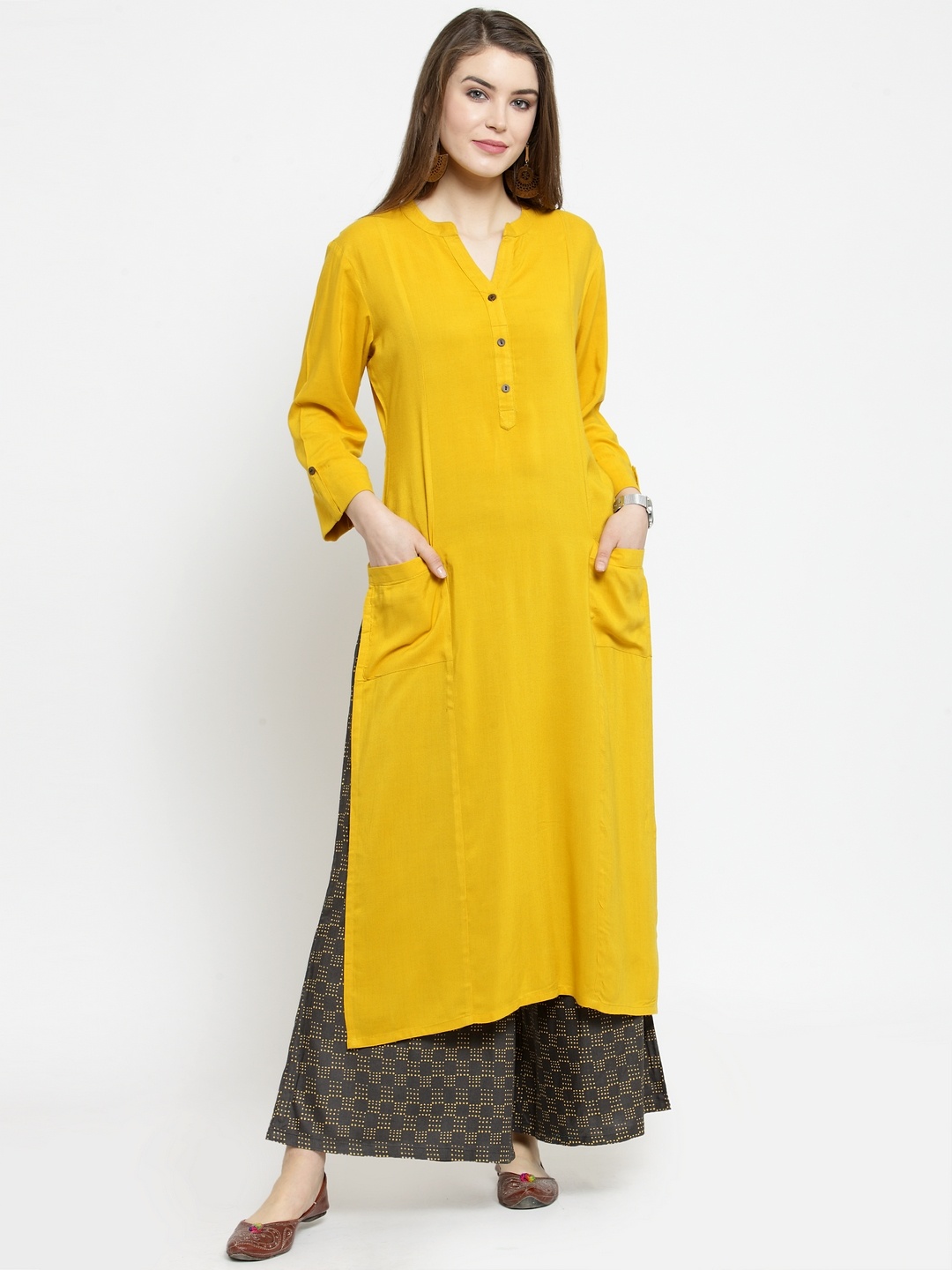 

Varanga Women Mustard Solid Kurta with Palazzos