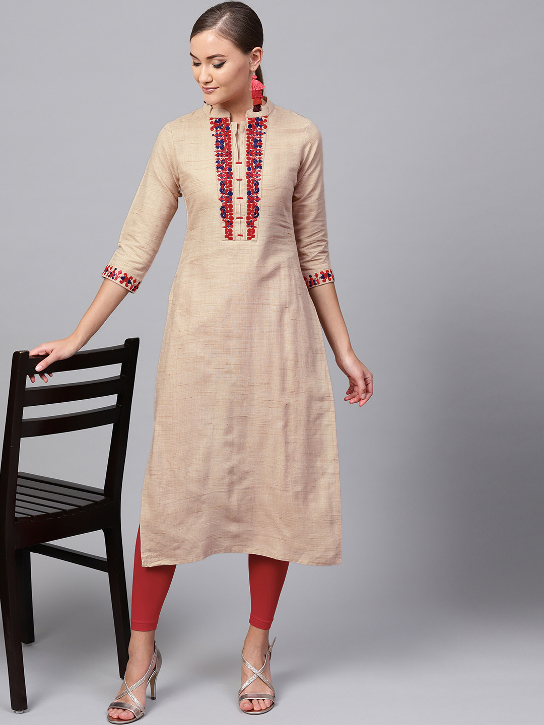 

Indo Era Women Beige & Red Solid Straight Kurta