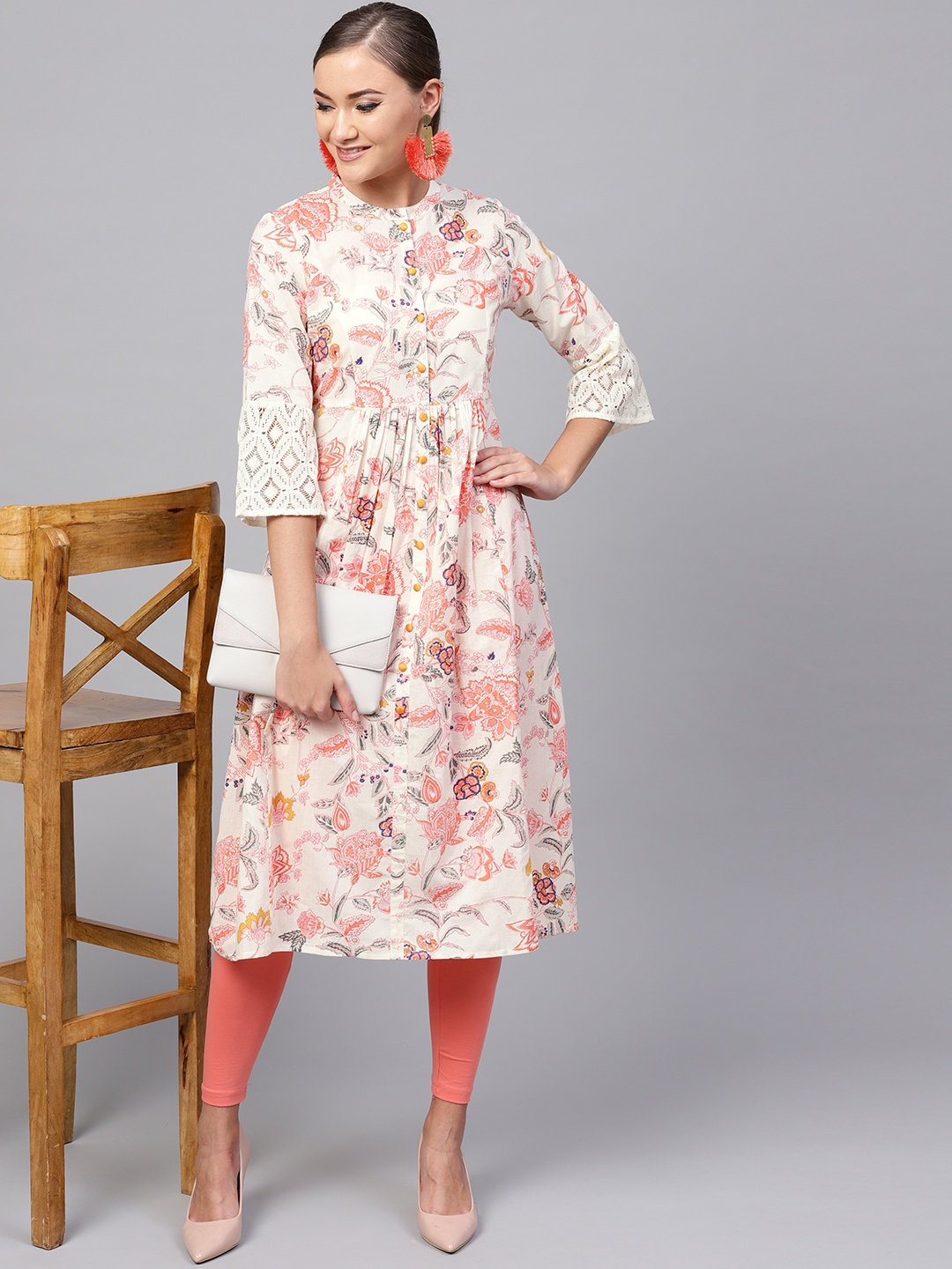 

Indo Era Women Off-White & Coral Pink Floral Printed A-Line Kurta