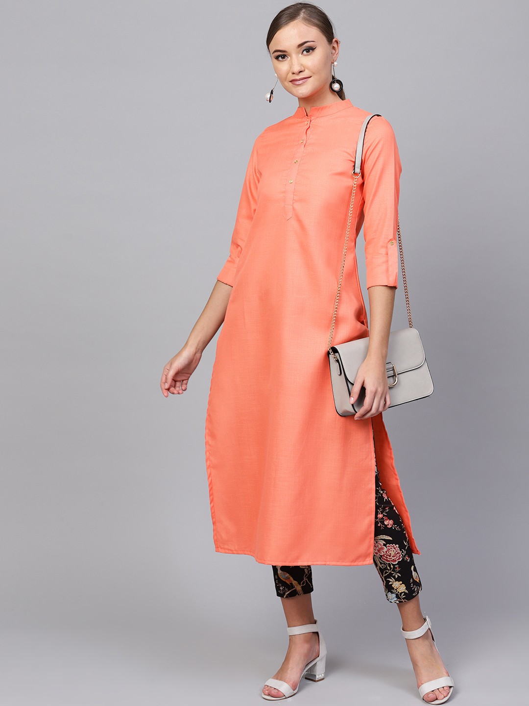 

Indo Era Women Coral Orange Solid Straight Kurta