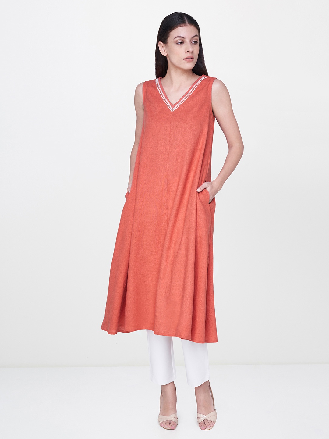 

AND Women Coral Orange Solid Straight Kurta