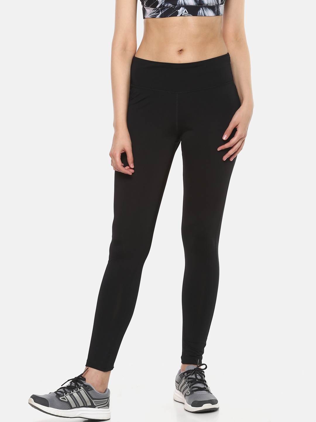 

Reebok Women Black Solid Workout PP Tights
