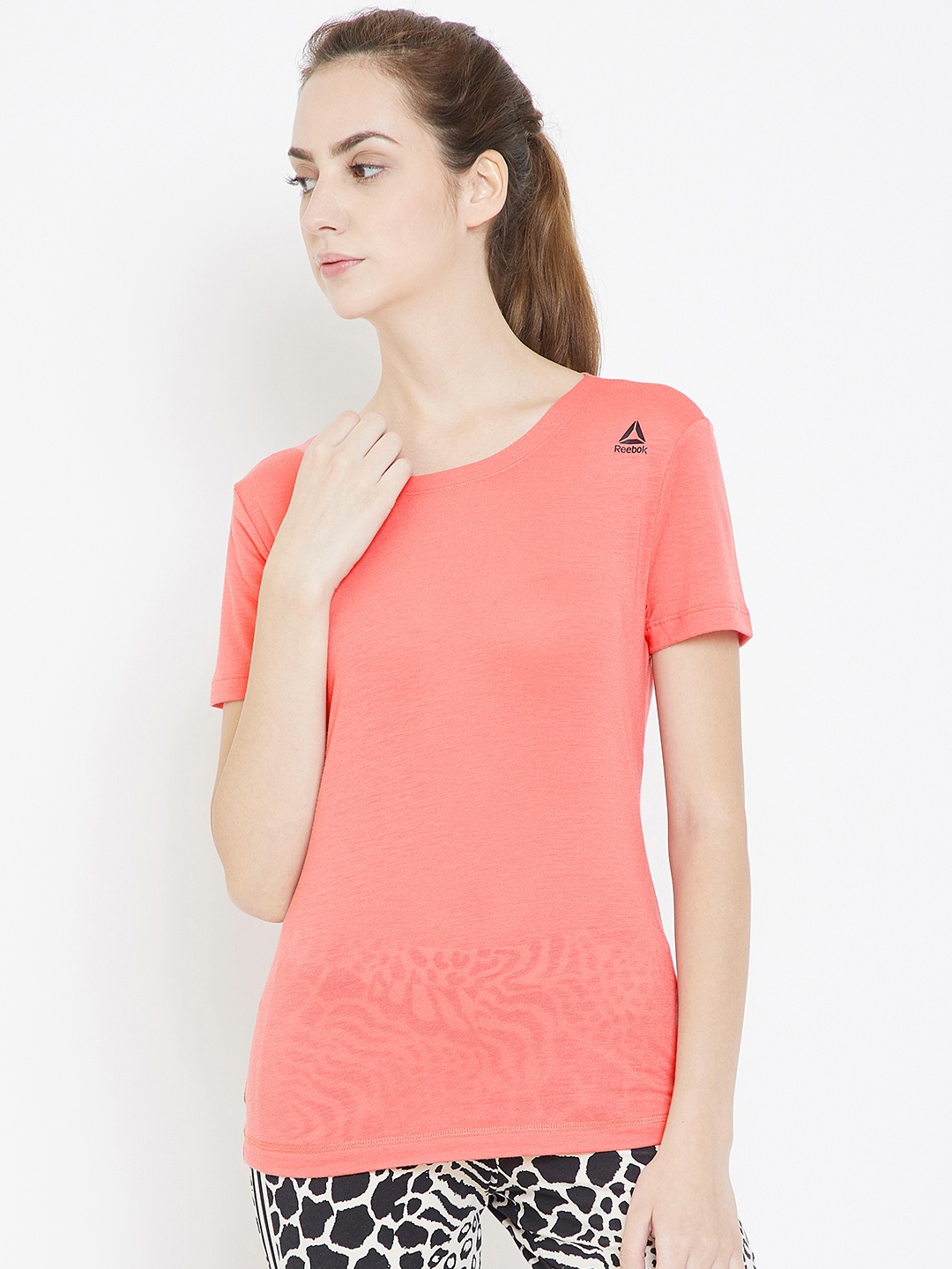 

Reebok Women Peach-Coloured Solid Star Round Neck Training T-shirt