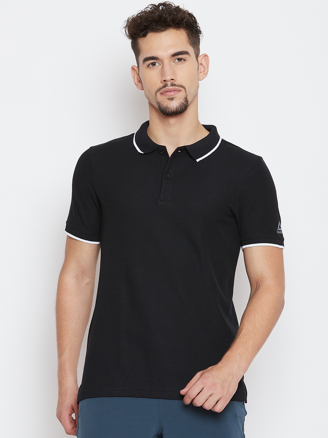 

Reebok Men Black Solid Training Essentials Polo T-shirt