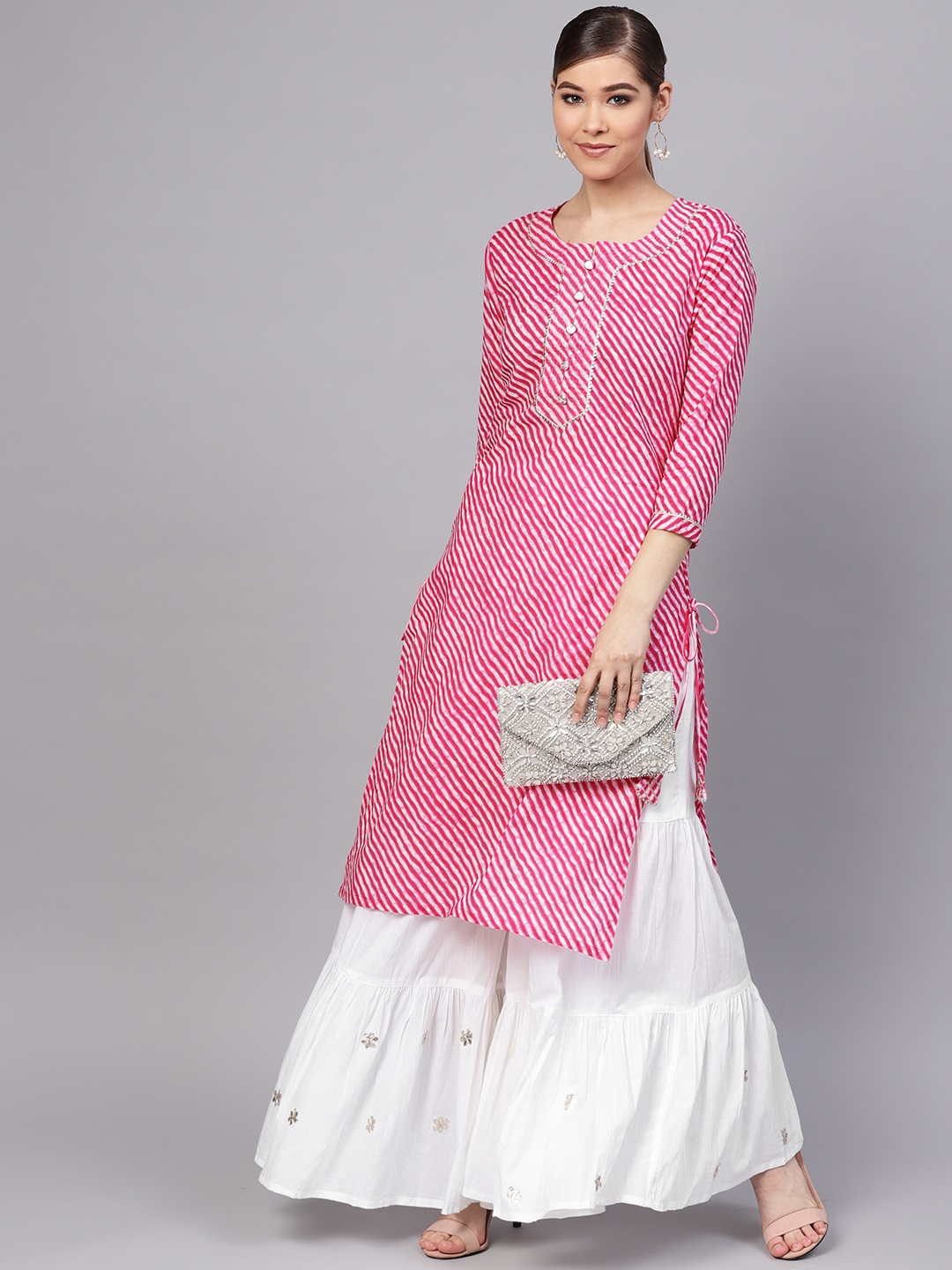 

Ishin Women Pink & White Striped Kurta with Sharara