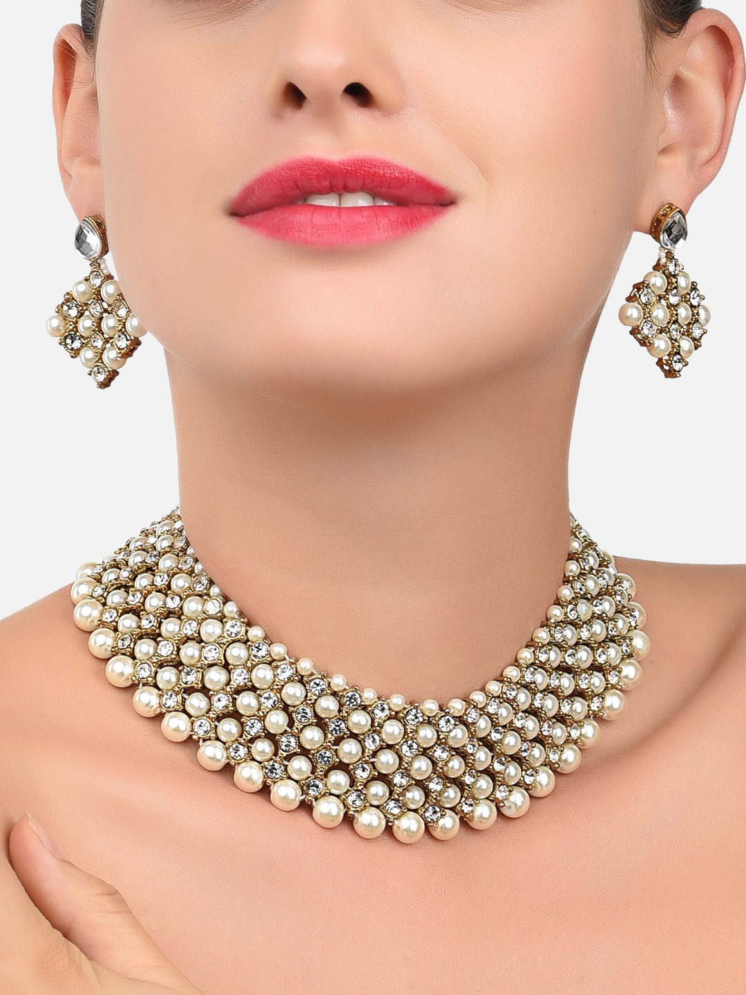 

Zaveri Pearls Gold-Toned & White Austrian Diamonds & Pearls Jewellery Set