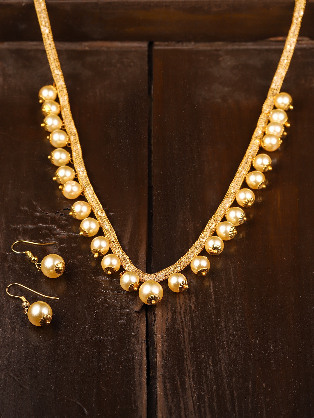 

Zaveri Pearls Gold-Toned Contemporary Style Dangling Pearls Jewellery Set