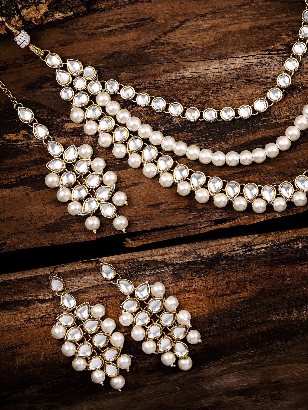 

Zaveri Pearls Gold Toned Kundan & Pearl Jewellery Set