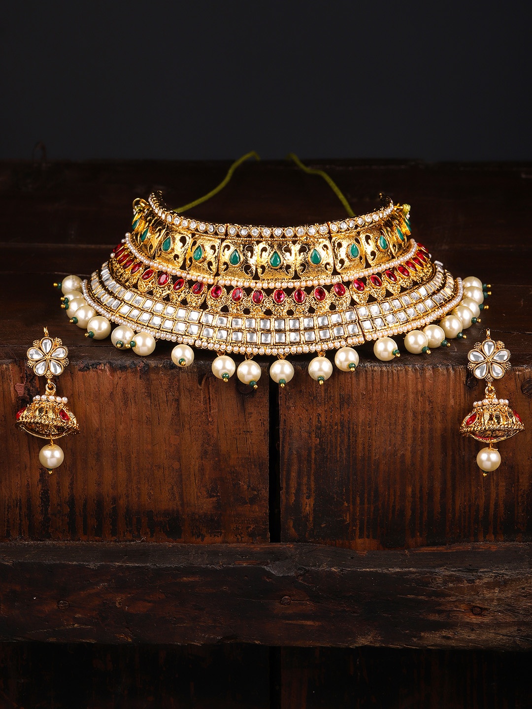 

Zaveri Pearls Gold Toned & Red Traditional Bridal Choker Jewellery Set