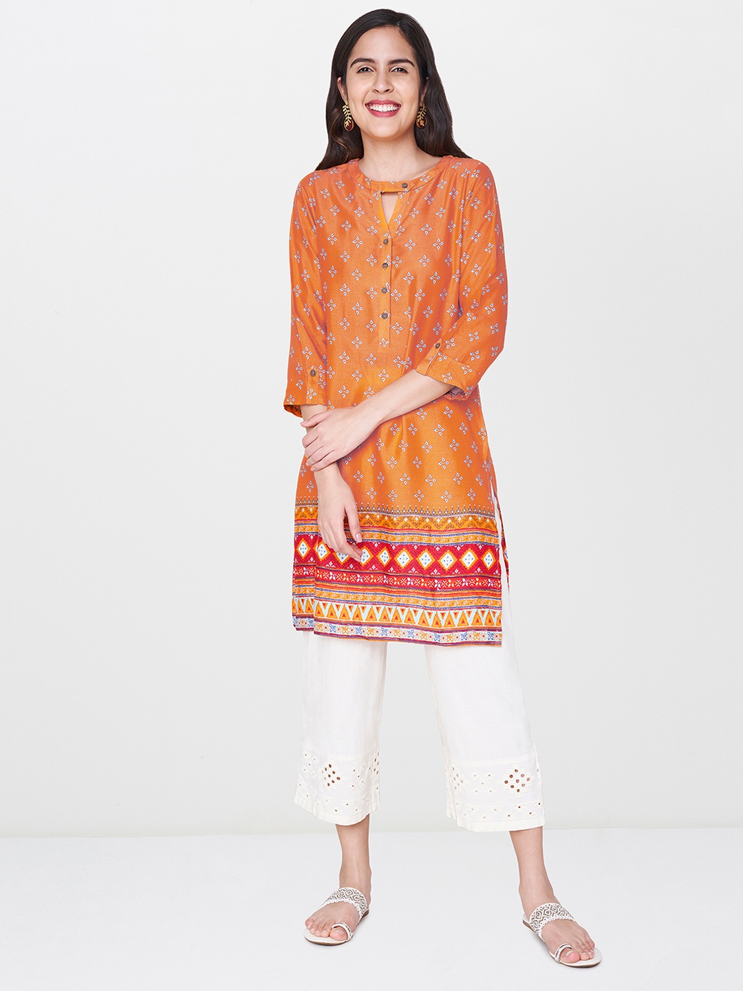 

Global Desi Women Orange Printed Straight Kurta