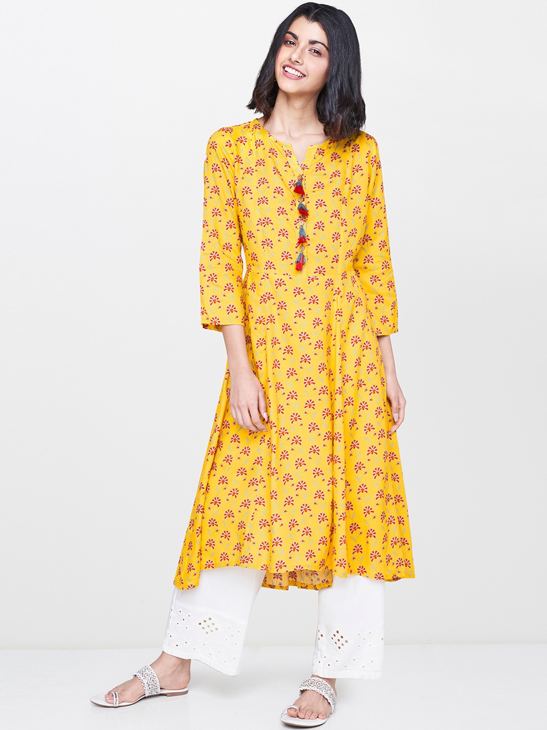 

Global Desi Women Mustard Yellow Printed A-Line Kurta