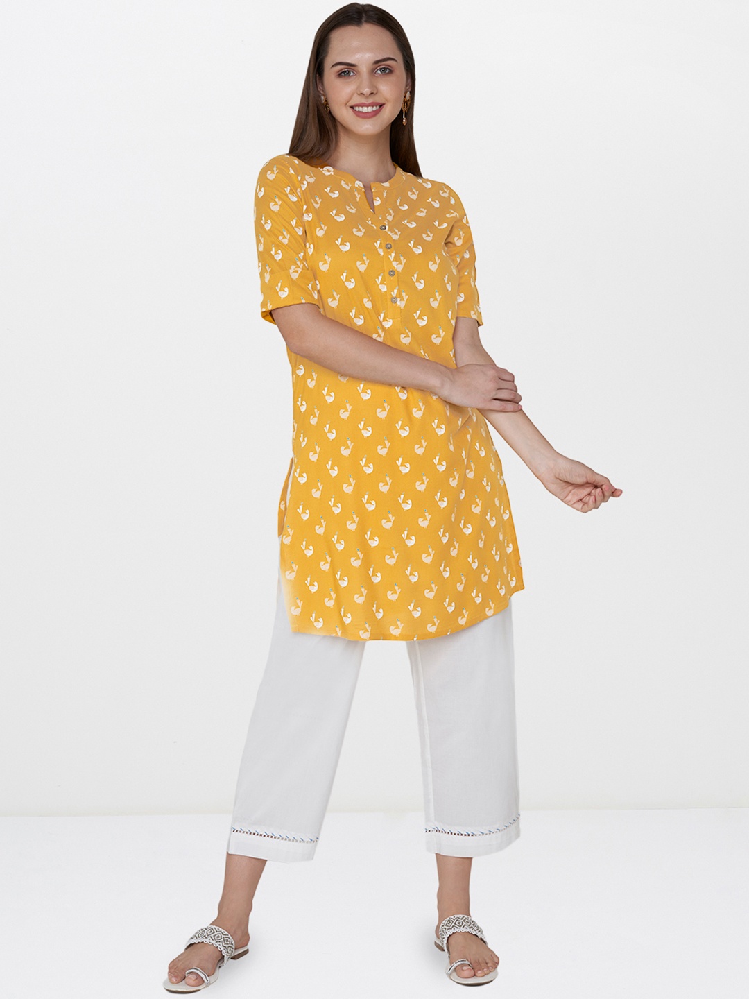

Global Desi Women Yellow Printed Tunic
