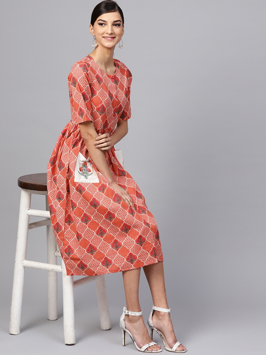 

Indo Era Women Orange Printed Midi A-Line Dress