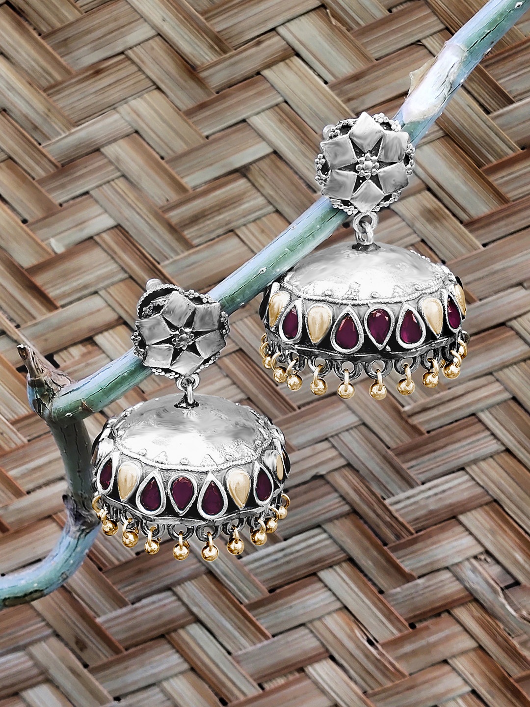 

Peora Women Silver-Toned Contemporary Jhumkas