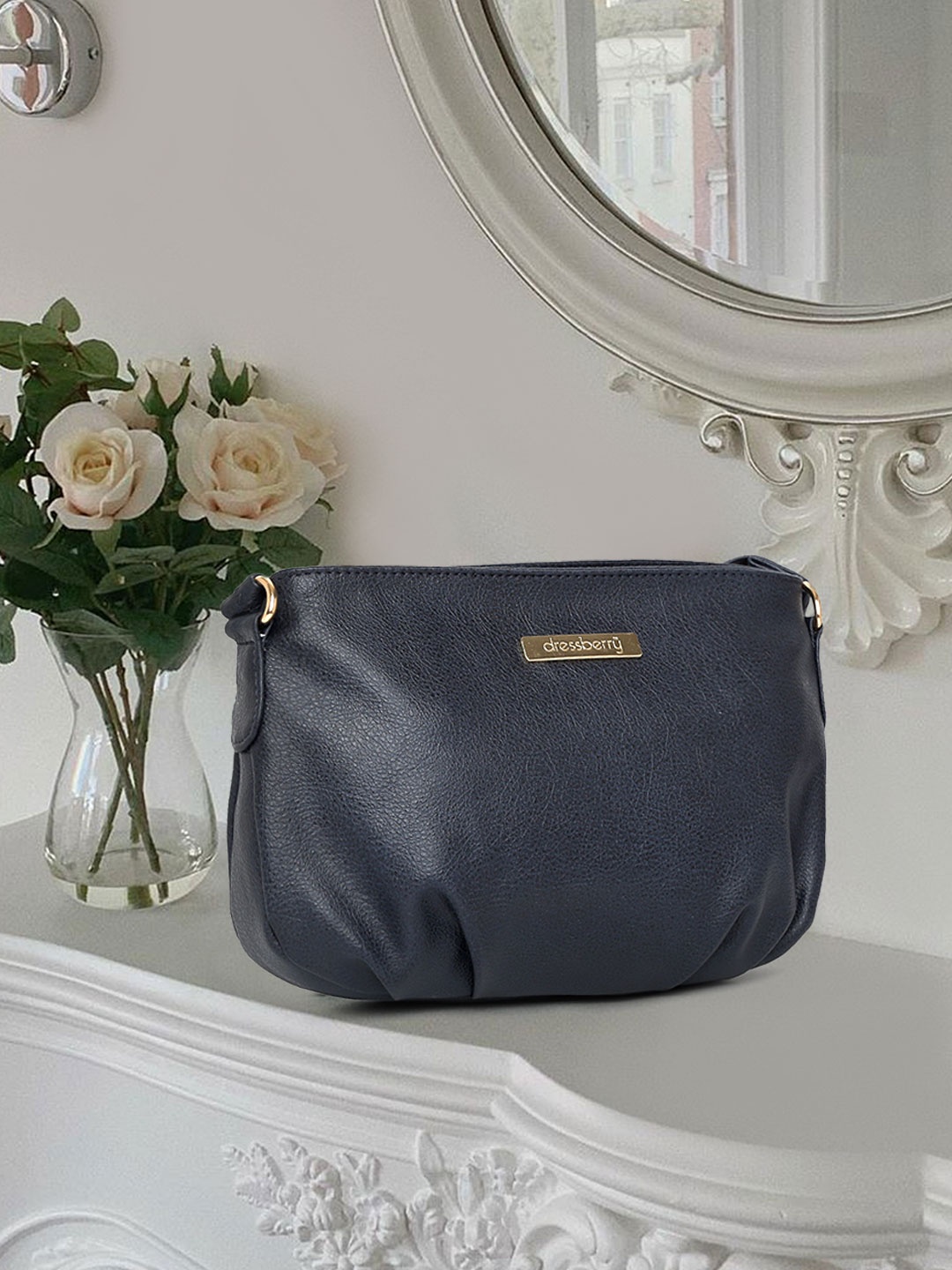 

DressBerry Navy Blue Solid Sling Bag