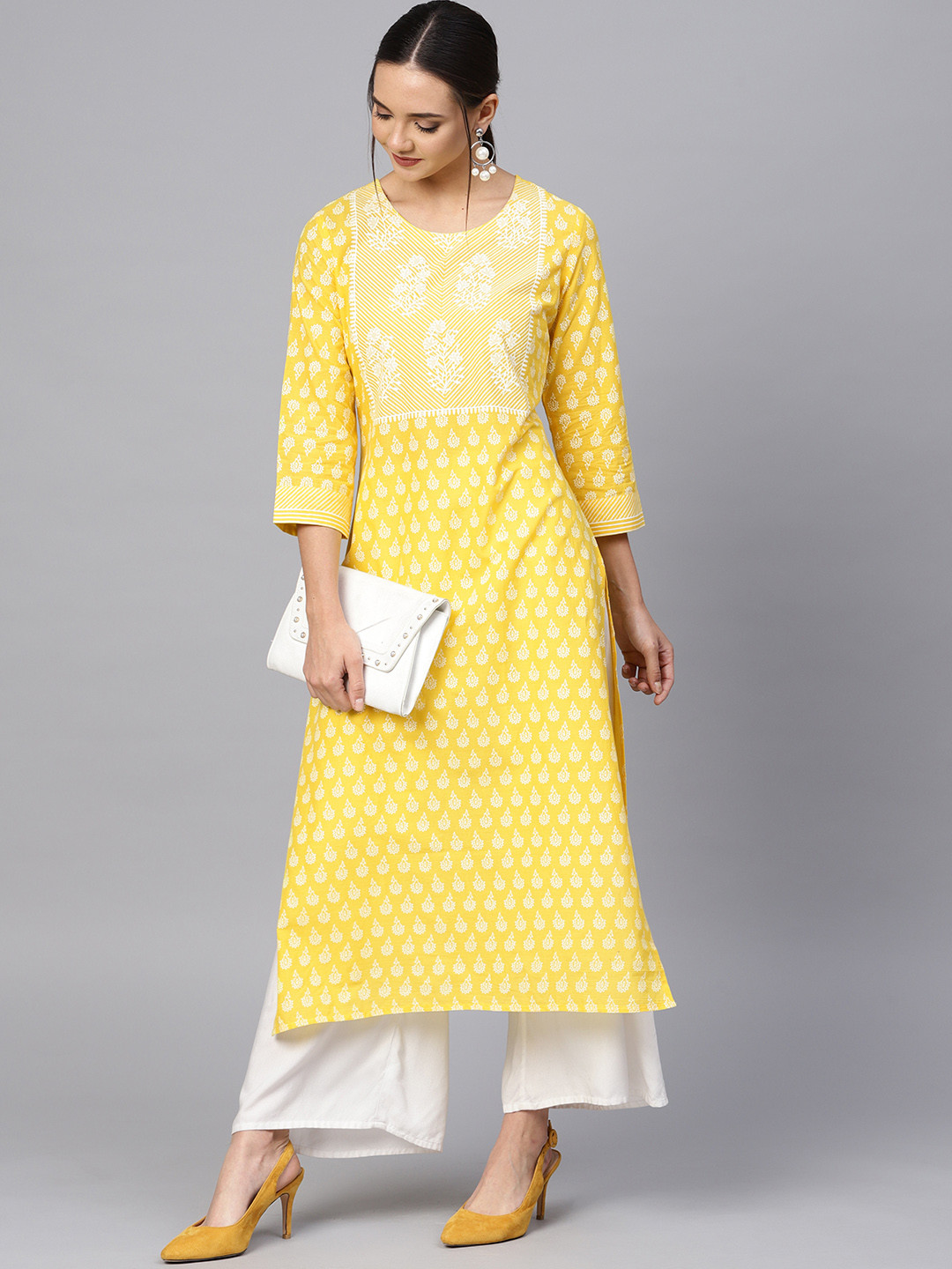 

Varanga Women Yellow & White Printed Straight Kurta