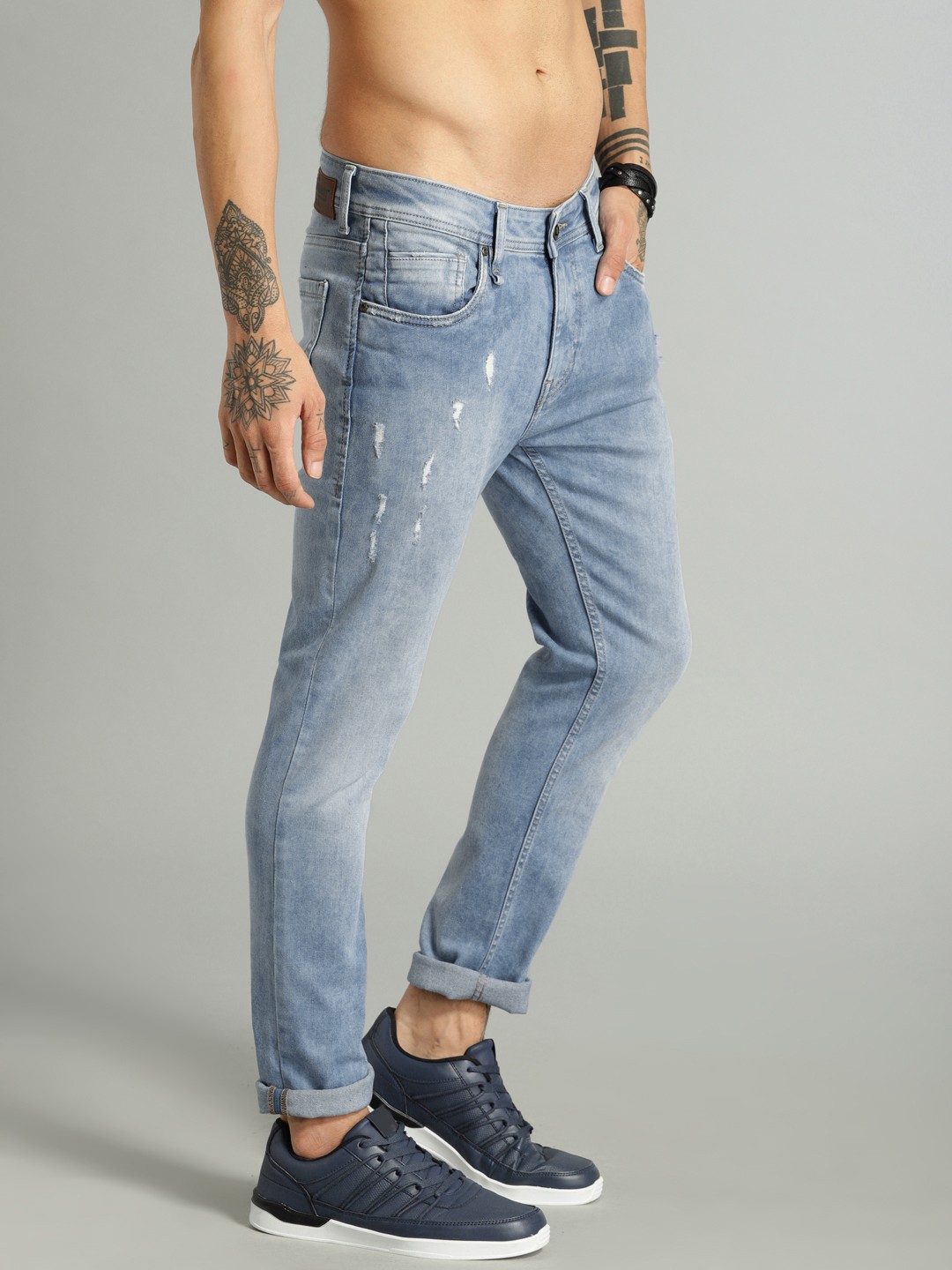 

The Roadster Lifestyle Co Men Blue Skinny Fit Mid-Rise Low Distressed Stretchable Jeans