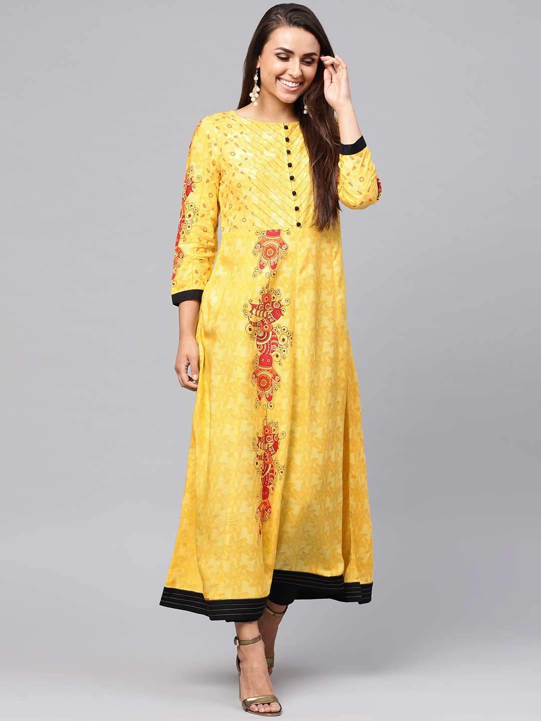 

Pannkh Women Yellow Printed A-Line Kurta