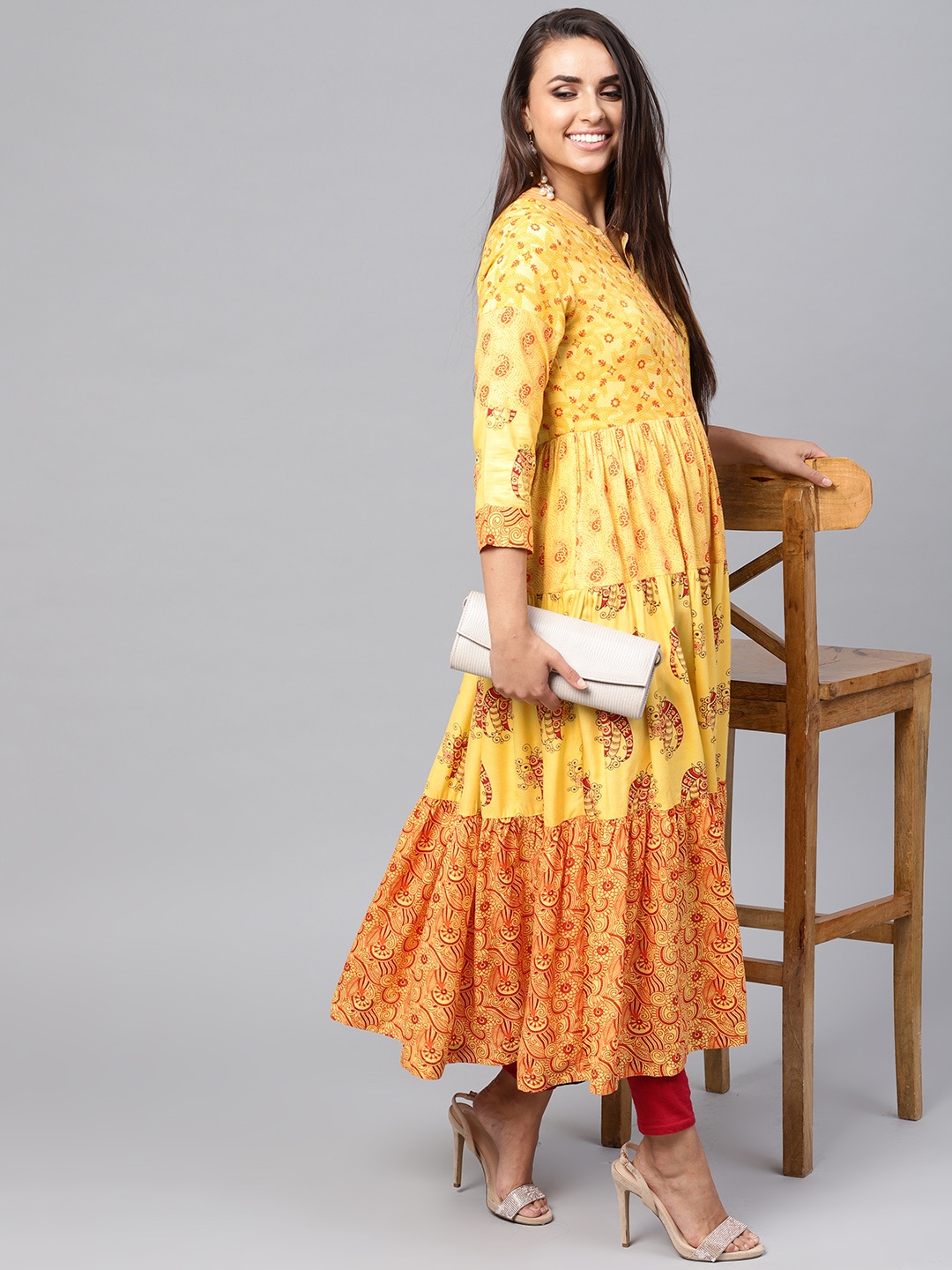 

Pannkh Women Yellow & Orange Printed Anarkali Kurta