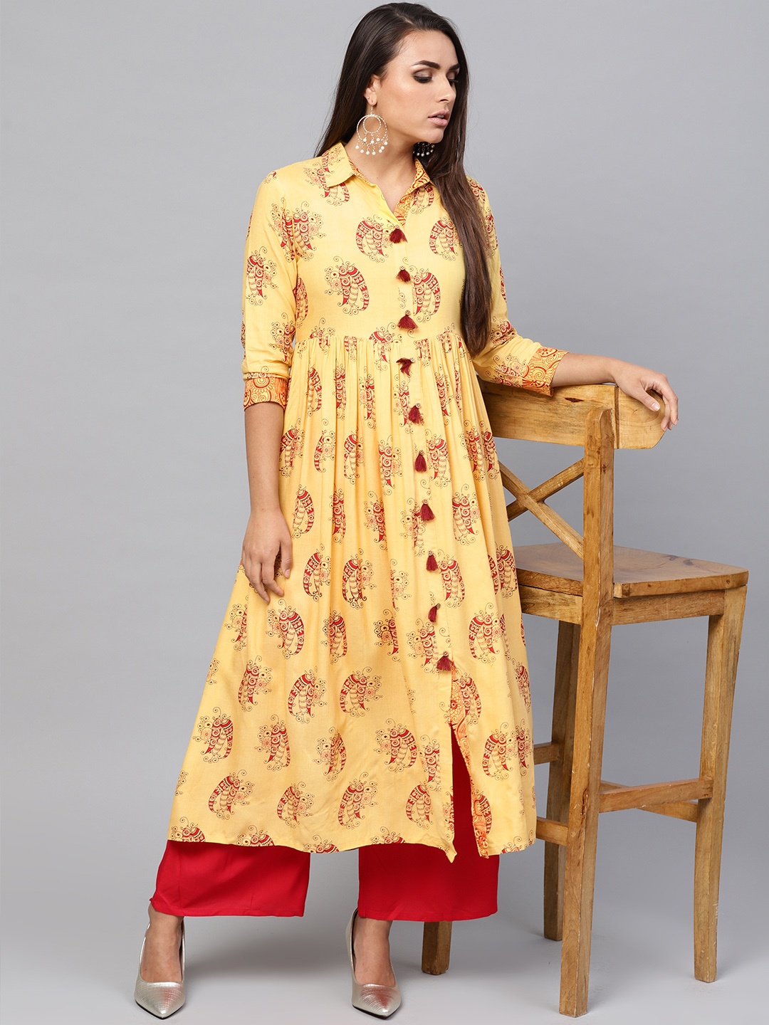 

Pannkh Women Yellow Printed A-Line Kurta