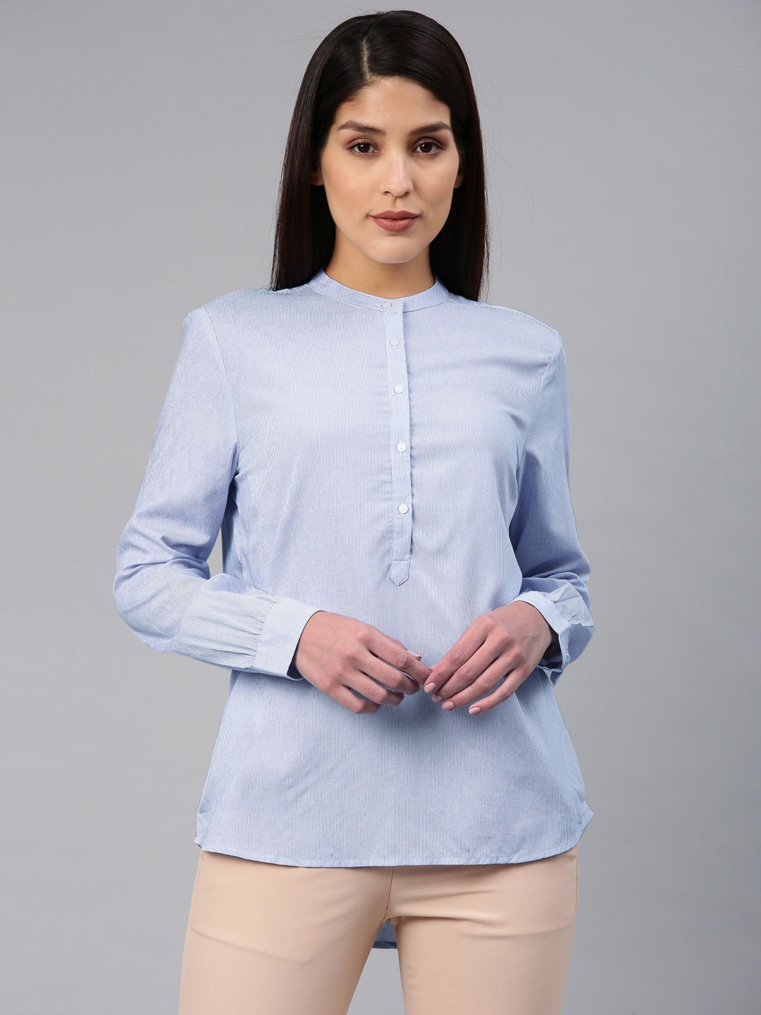 

Van Heusen Woman Blue Solid Formal Shirt