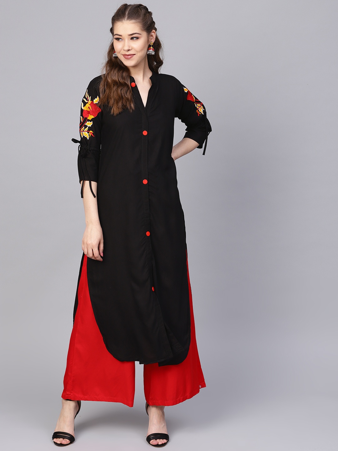 

Yuris Women Black Solid Straight Kurta