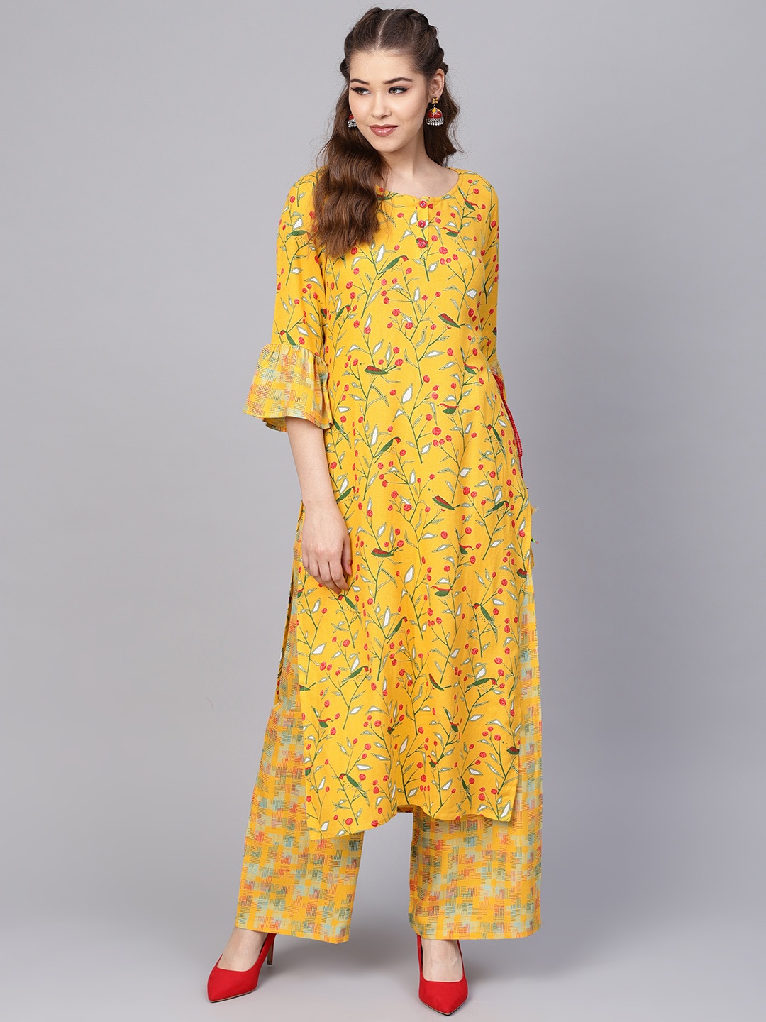 

Yuris Women Mustard Yellow Printed Kurta with Palazzos