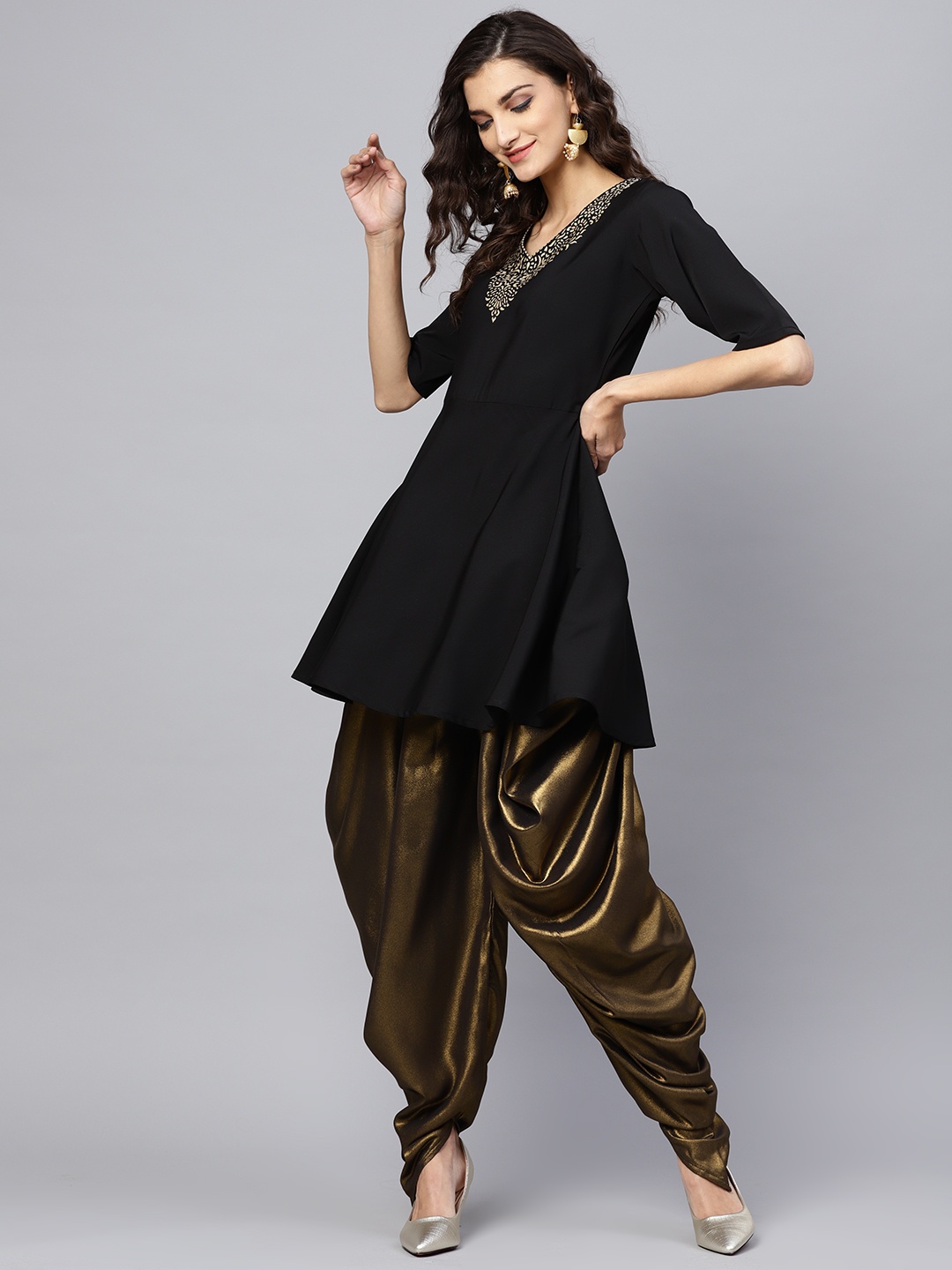 

Ahalyaa Women Black & Golden Yoke Design Kurti with Dhoti Pants
