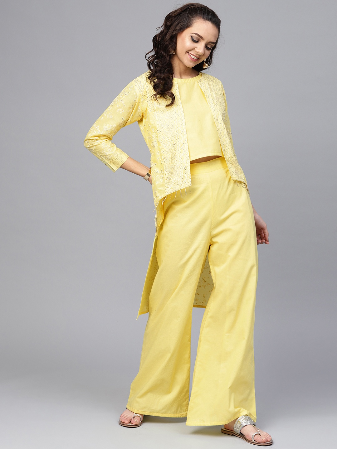 

Ahalyaa Women Yellow Solid Top with Palazzos & Shrug