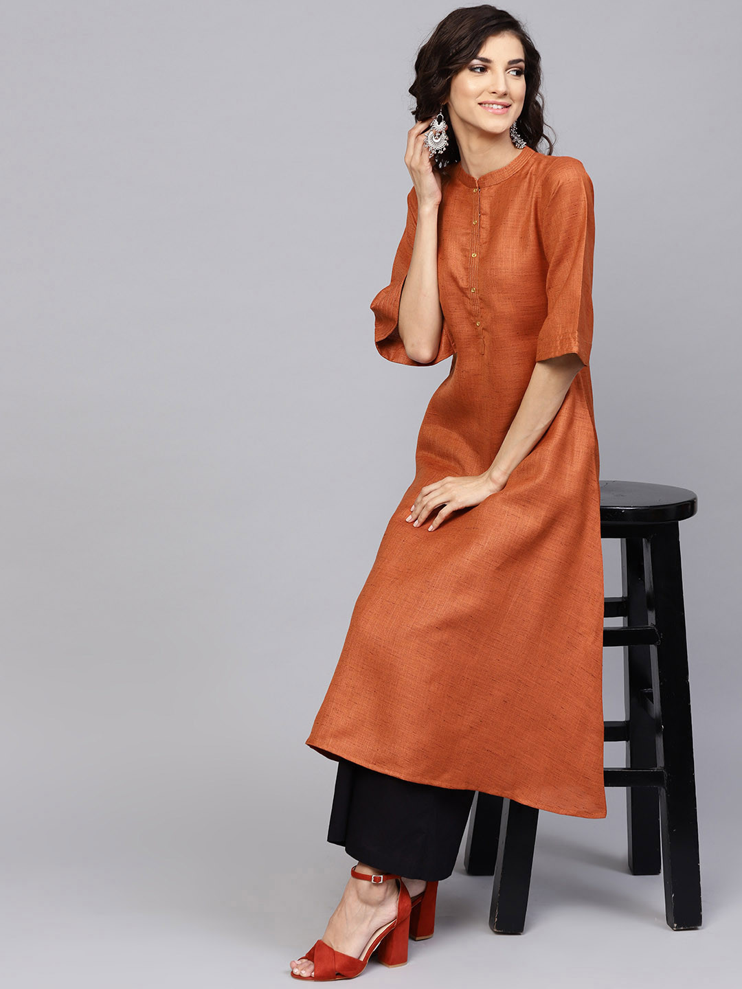 

Libas Women Rust Orange Solid A-Line Kurta