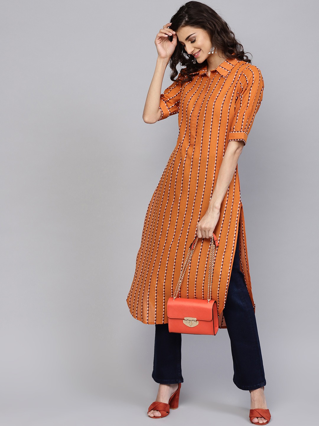 

Libas Women Rust Orange & Navy Blue Striped Pathani Kurta