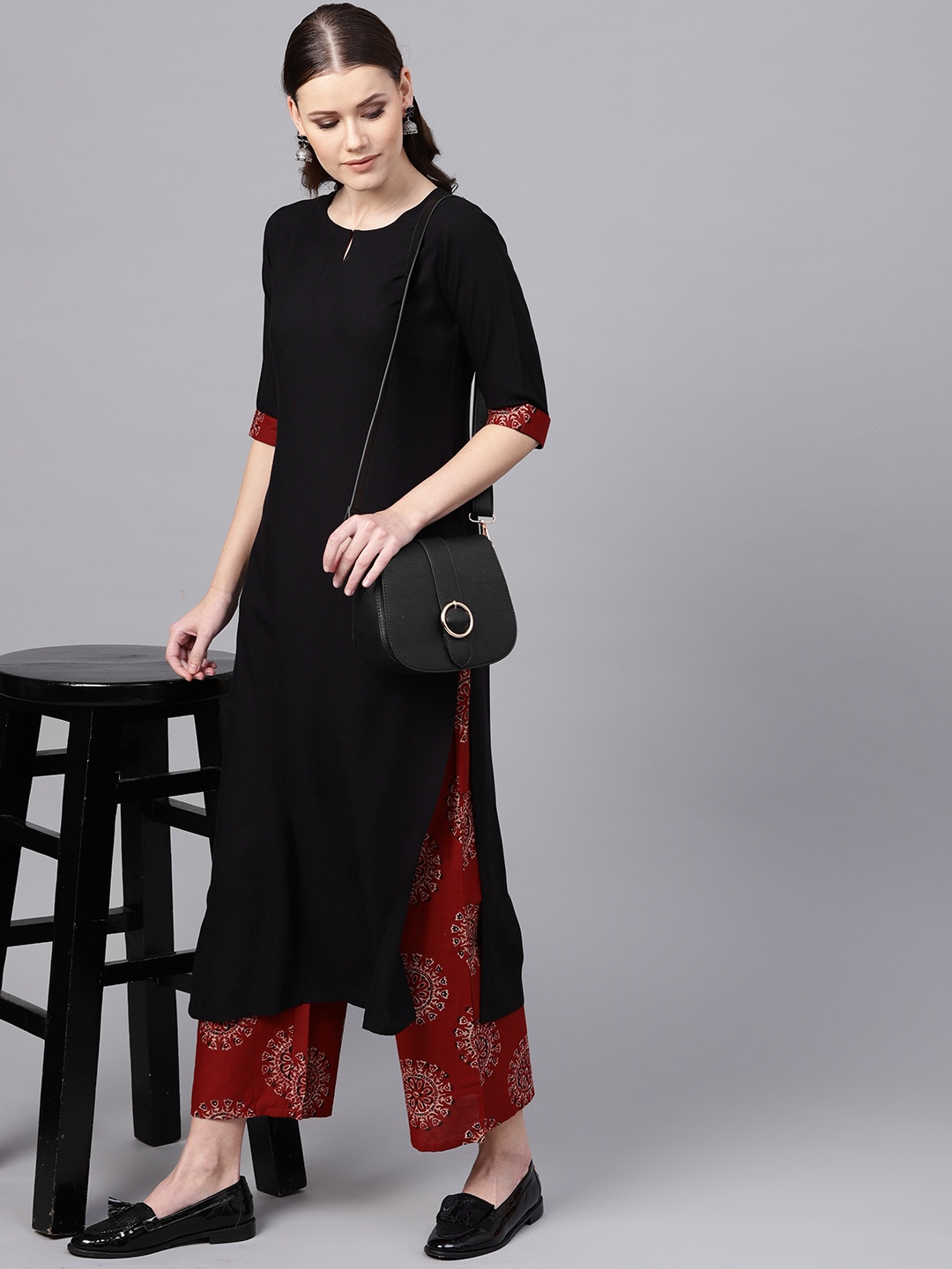 

Libas Women Black & Maroon Solid Kurta with Palazzos
