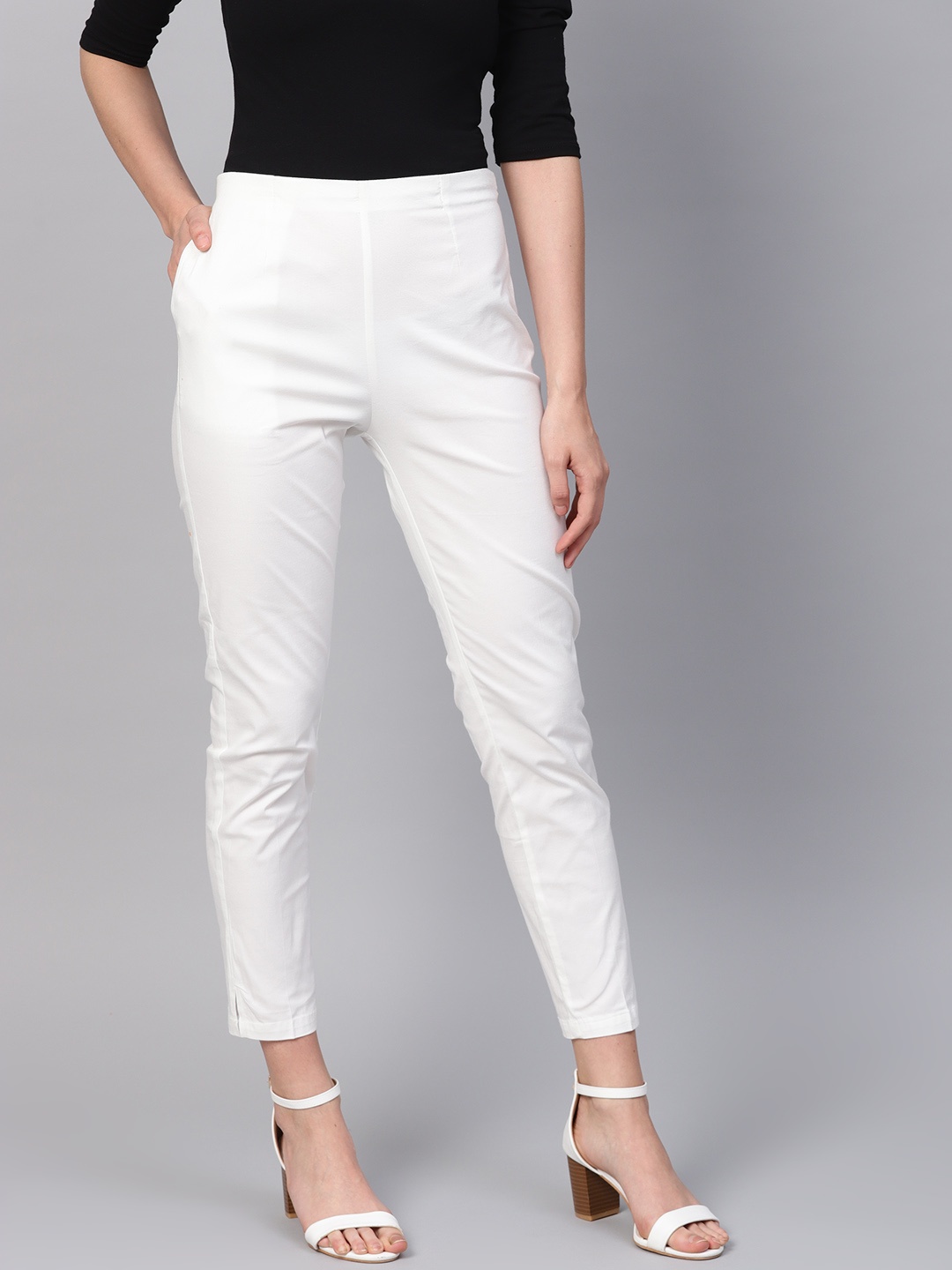 

SOJANYA Women White Slim Fit Solid Cropped Trousers