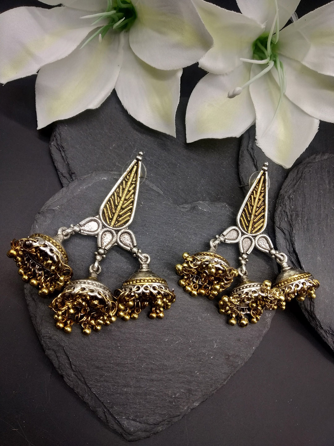 

Fida Oxidised Gold & Silver Toned Dome Shaped Jhumkas