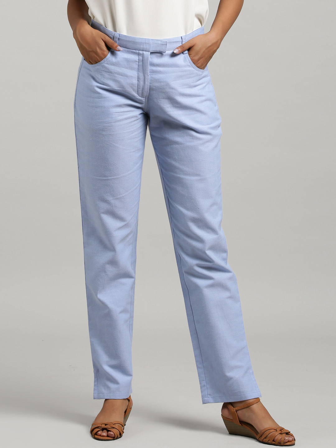 

FableStreet Women Blue Regular Fit Solid Regular Trousers