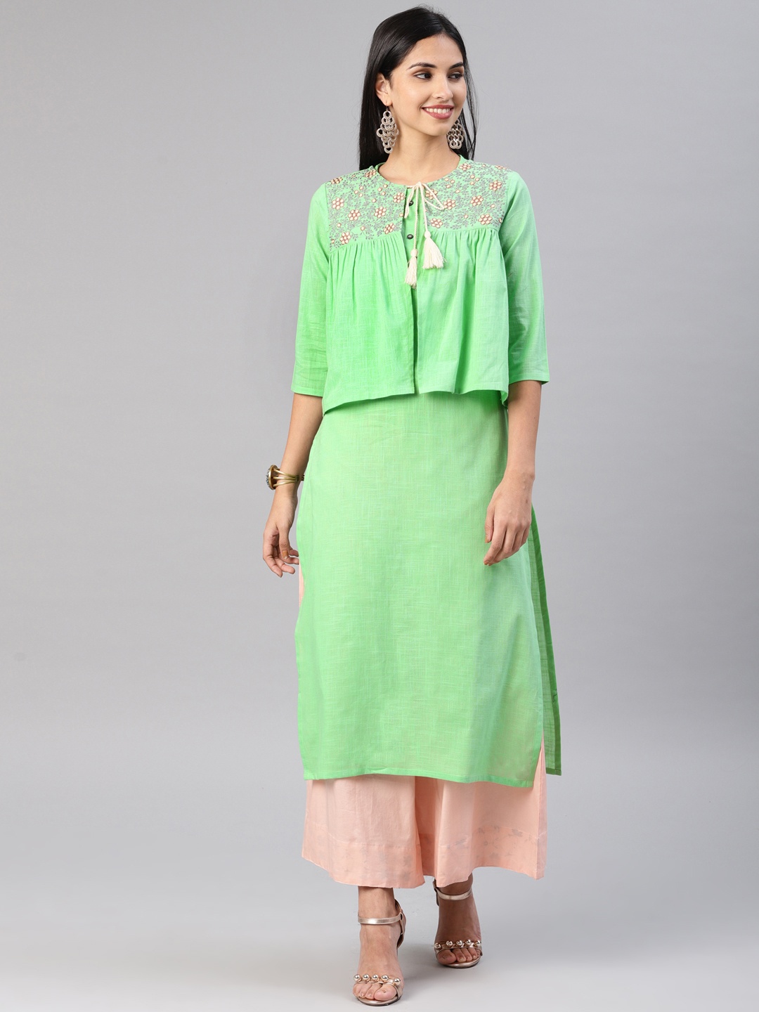 

Alena Women Green Solid Layered Straight Kurta with Embroidered Jacket