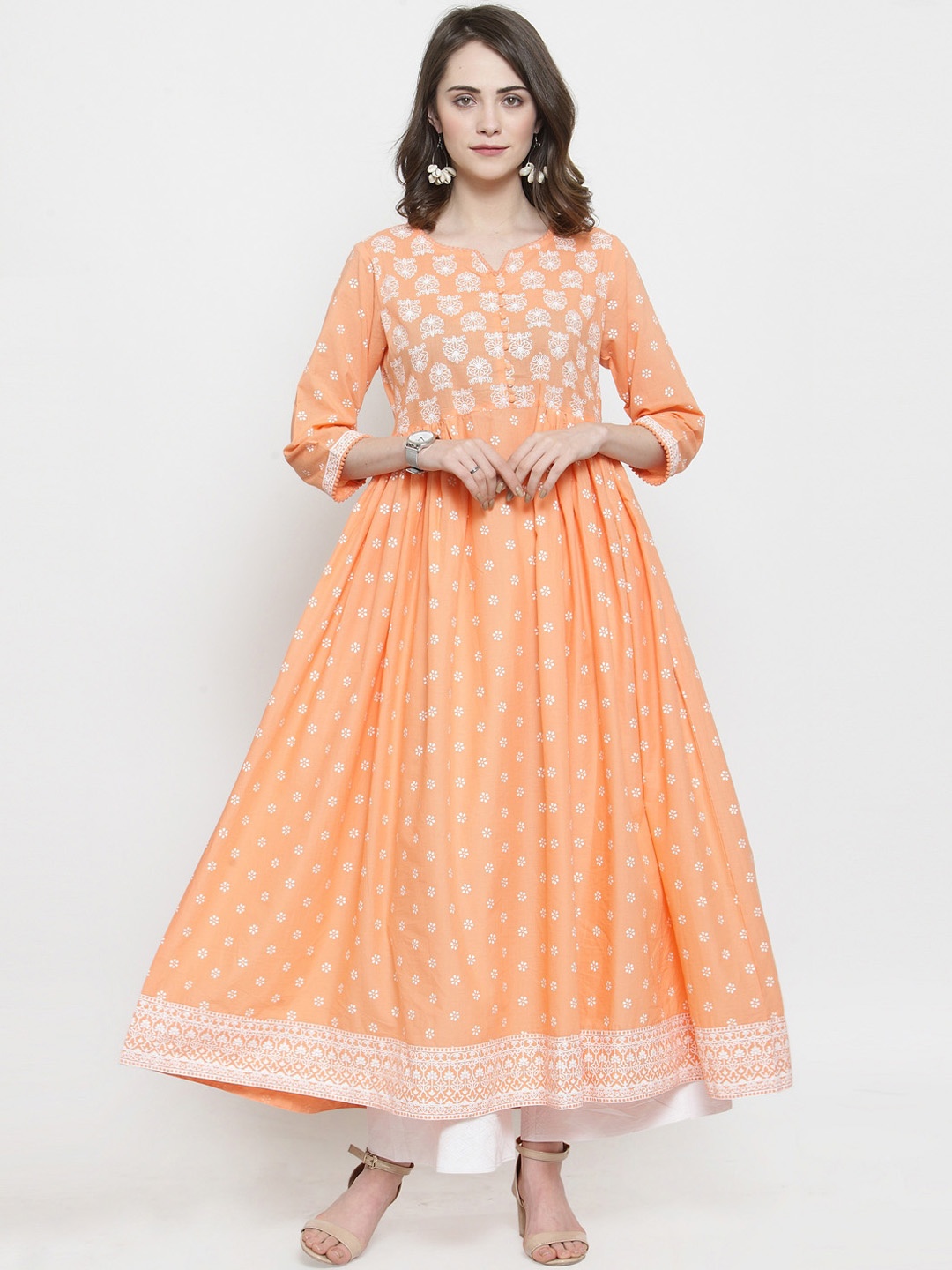 

Varanga Women Peach-Coloured & White Printed Kurti with Palazzos