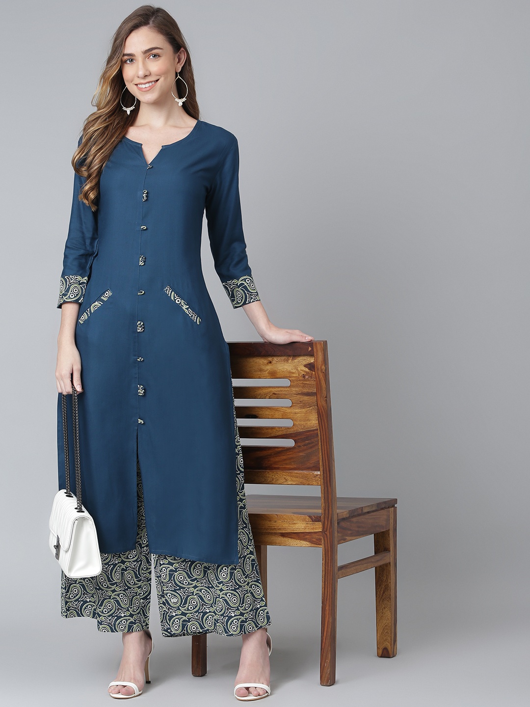 

Khushal K Women Teal Blue Printed Kurta with Palazzos