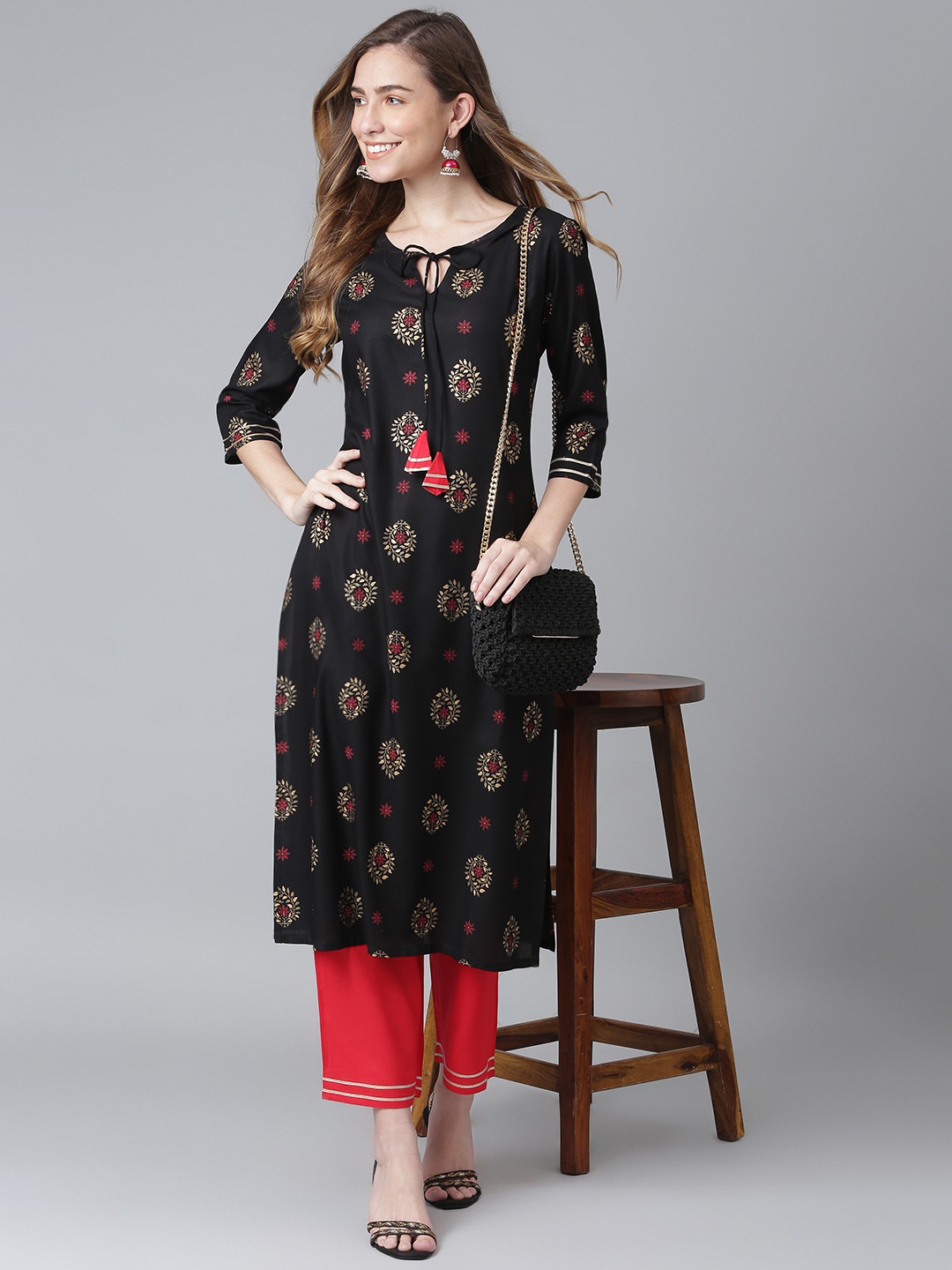 

Khushal K Women Black Floral Printed Regular Pure Cotton Kurta with Palazzos