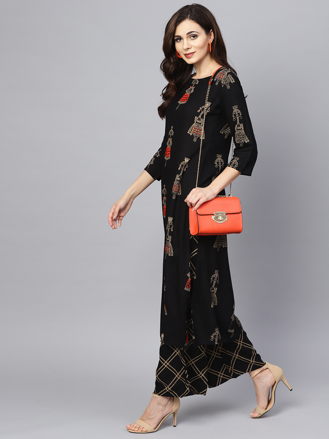

Ishin Women Black Kalamkari Print Kurta with Palazzos