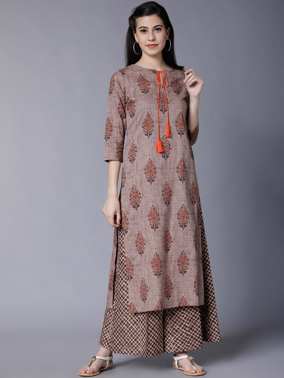 

Vishudh Women Brown Printed Kurta with Palazzos