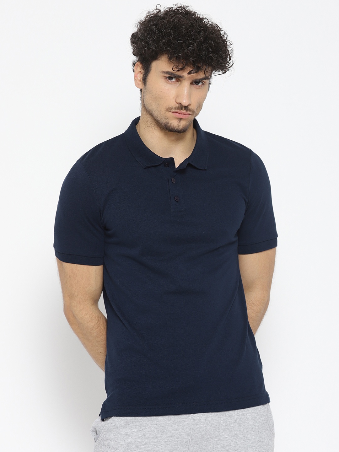 

Alcis Men Navy Blue Solid Polo Collar T-shirt