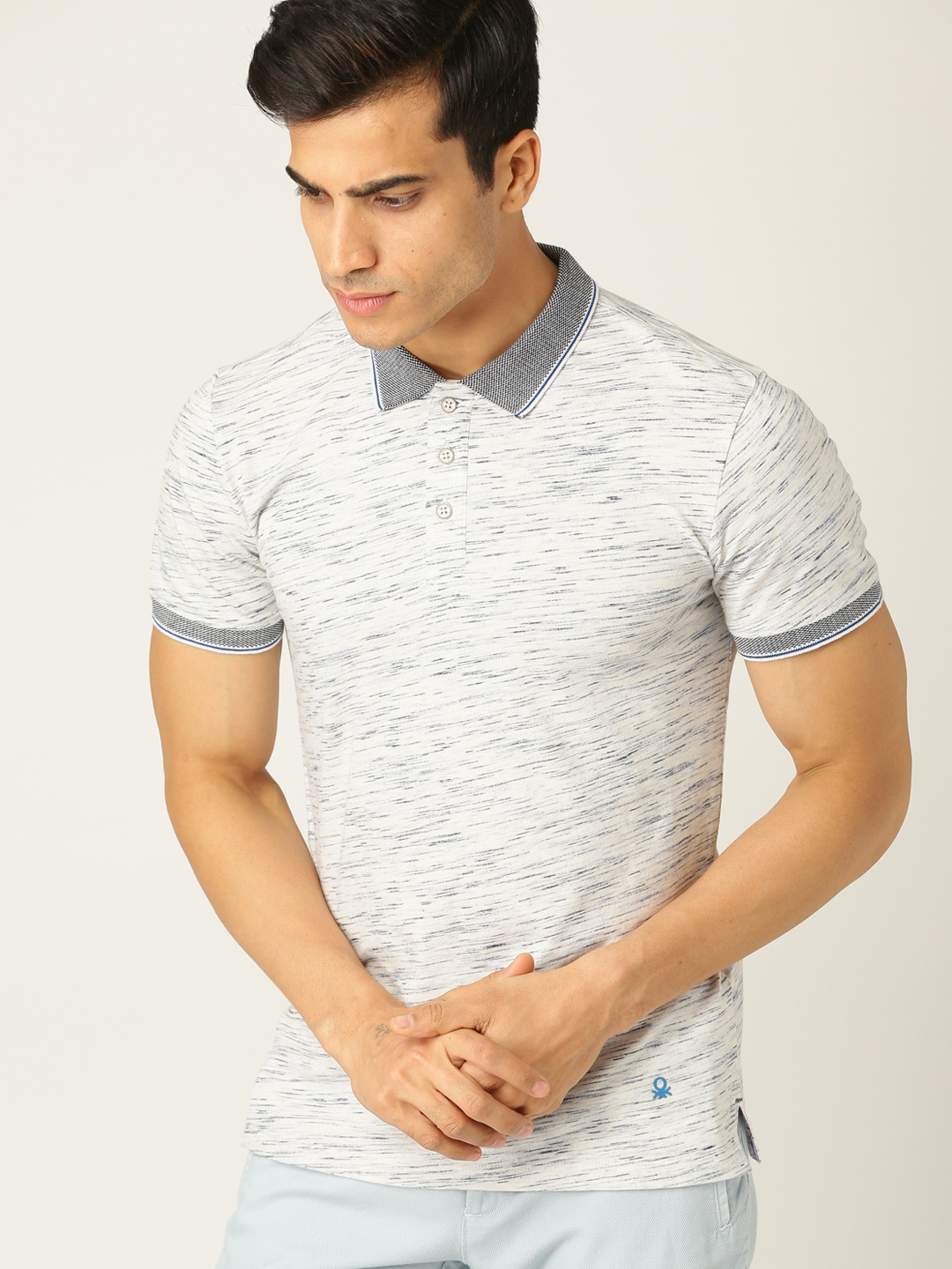 

United Colors of Benetton Men White Solid Polo Collar T-shirt