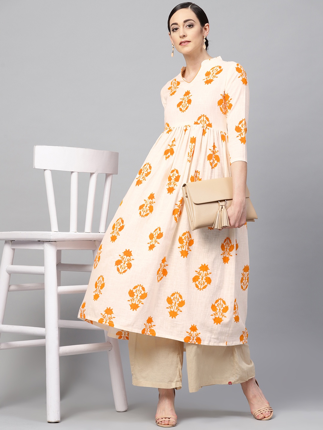 

AHIKA Women Cream-Coloured & Orange Printed A-Line Kurta