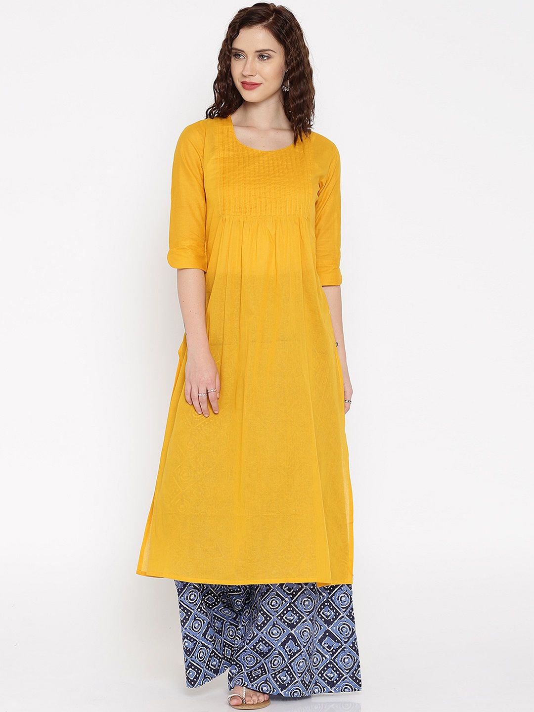 

Desi Weavess Women Yellow Solid Straight Kurta