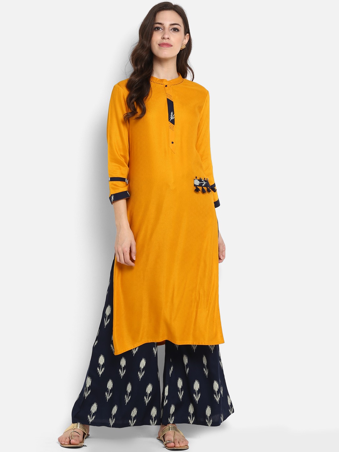 

Meeranshi Women Mustard Yellow Printed Kurta with Palazzos